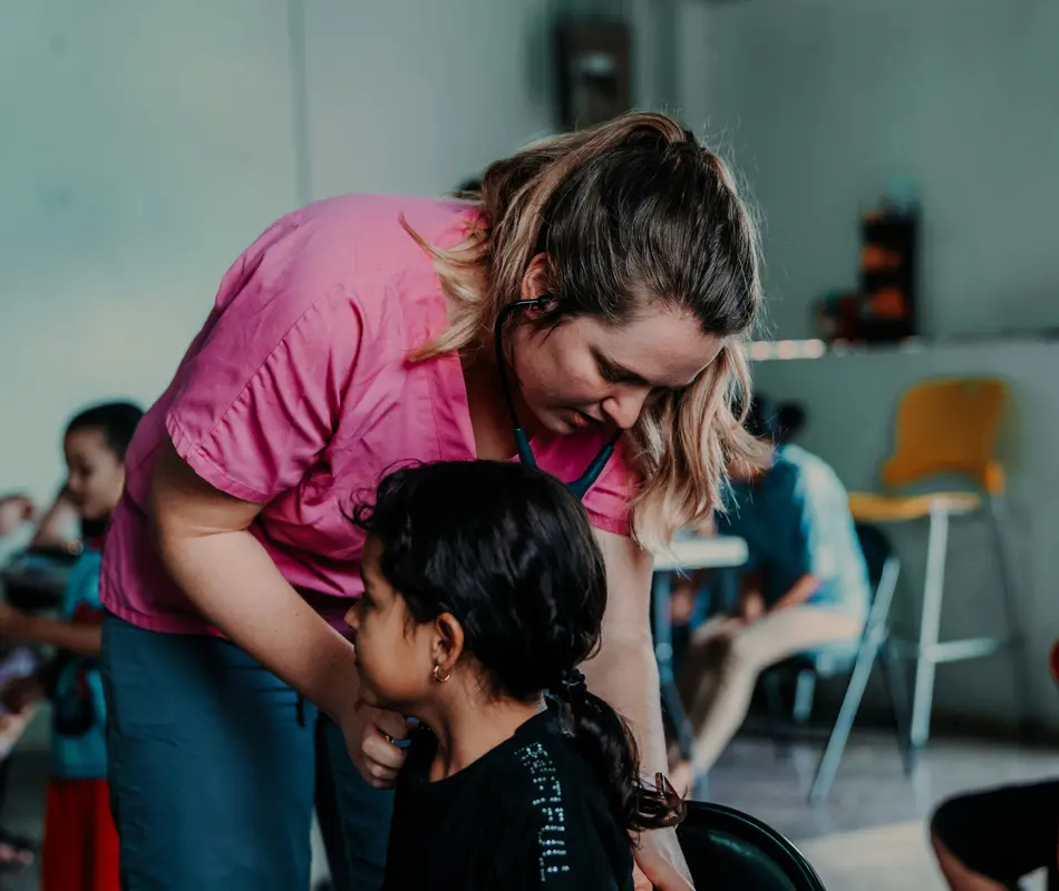 woman checking child